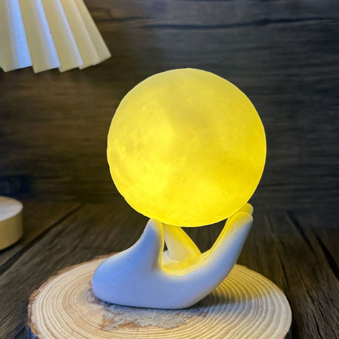 Zeitgenössische kreative Hand 3D-gedruckte Mond PVC LED Tischlampe für das Schlafzimmer