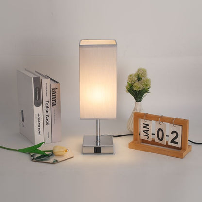 Zeitgenössische Einfachheit Stoff Kubus Schirm Hardware Basis 1-Licht Tischlampe Für Schlafzimmer