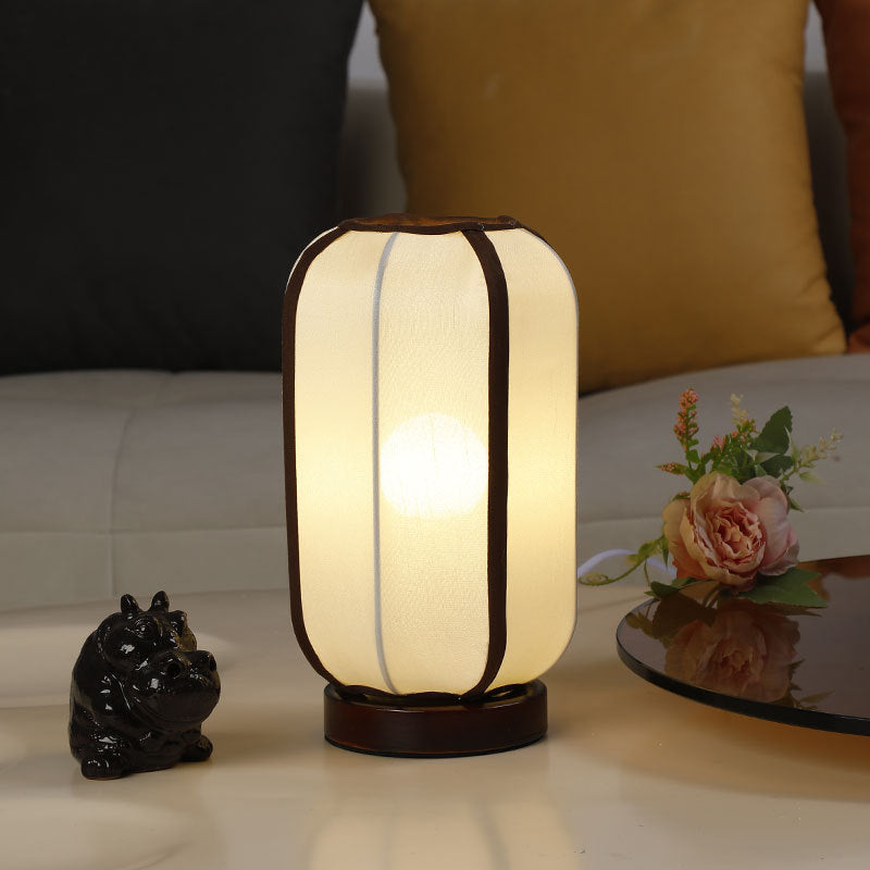 Traditioneller chinesischer Stoffzylinder-Schirm Holzfuß 1-Licht Tischlampe für Schlafzimmer