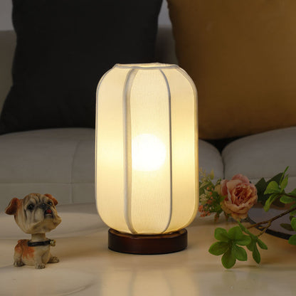 Traditioneller chinesischer Stoffzylinder-Schirm Holzfuß 1-Licht Tischlampe für Schlafzimmer