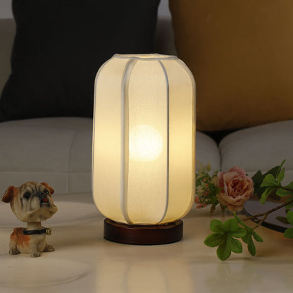 Traditioneller chinesischer Stoffzylinder-Schirm Holzfuß 1-Licht Tischlampe für Schlafzimmer