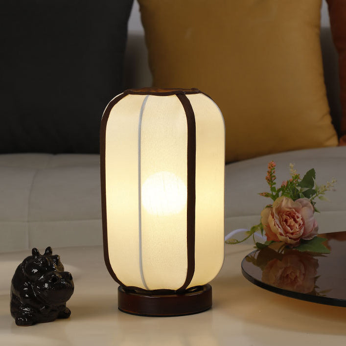 Traditioneller chinesischer Stoffzylinder-Schirm Holzfuß 1-Licht Tischlampe für Schlafzimmer