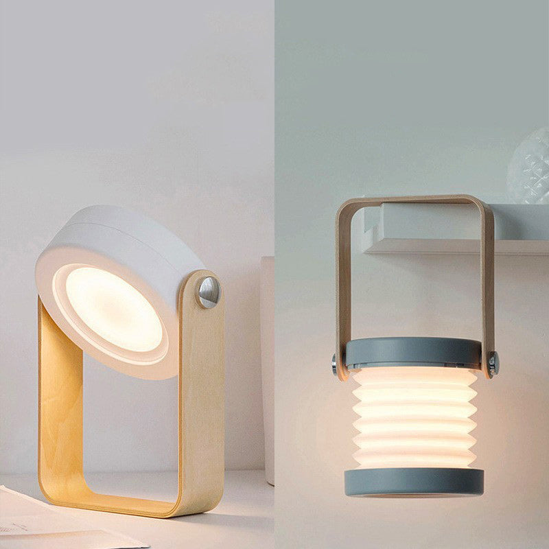 Zeitgenössische skandinavische tragbare ausziehbare Laterne zylindrische Holz Eisen PC LED Tischlampe für das Schlafzimmer