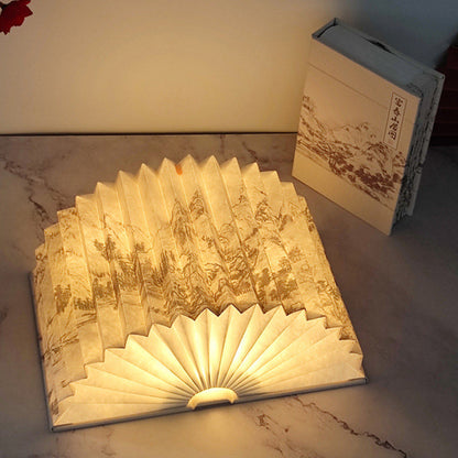 Zeitgenössische kreative faltbare Buchform Rechteck PU Papier LED Tischlampe für Schlafzimmer